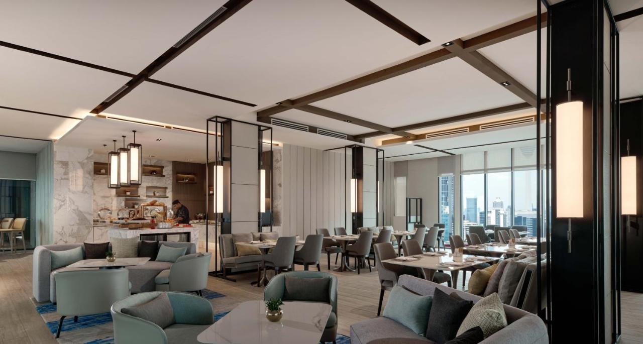 Pan Pacific Serviced Suites Kuala Lumpur Kültér fotó The Club at Changi Airport