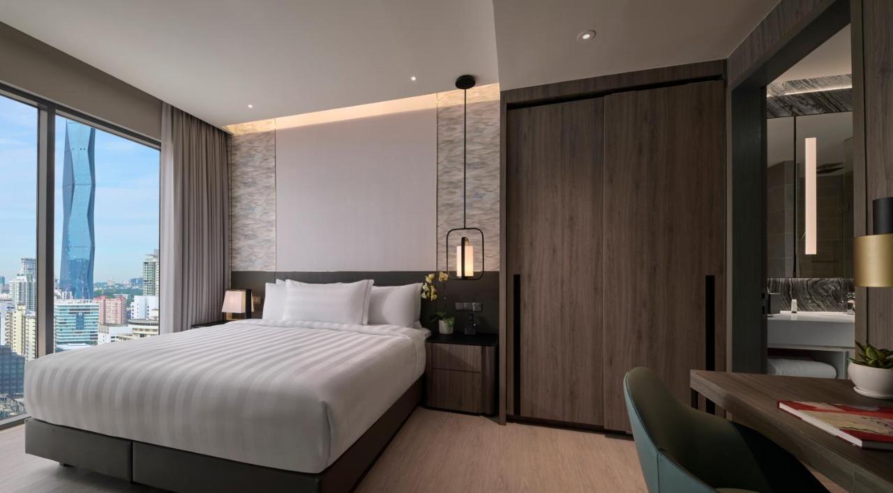 Pan Pacific Serviced Suites Kuala Lumpur Kültér fotó Deluxe Room