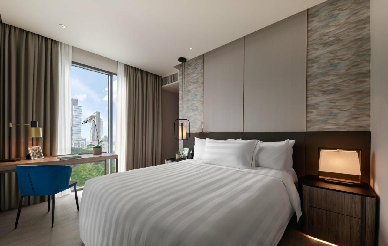 Pan Pacific Serviced Suites Kuala Lumpur Kültér fotó Deluxe Room
